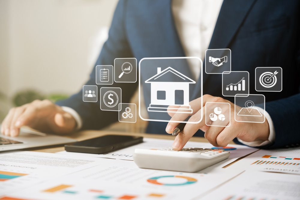Real estate investor reviewing passive activity loss rules and investment property tax information